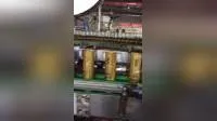 Machine d'étiquetage à manchon rétractable pour bouteille PET